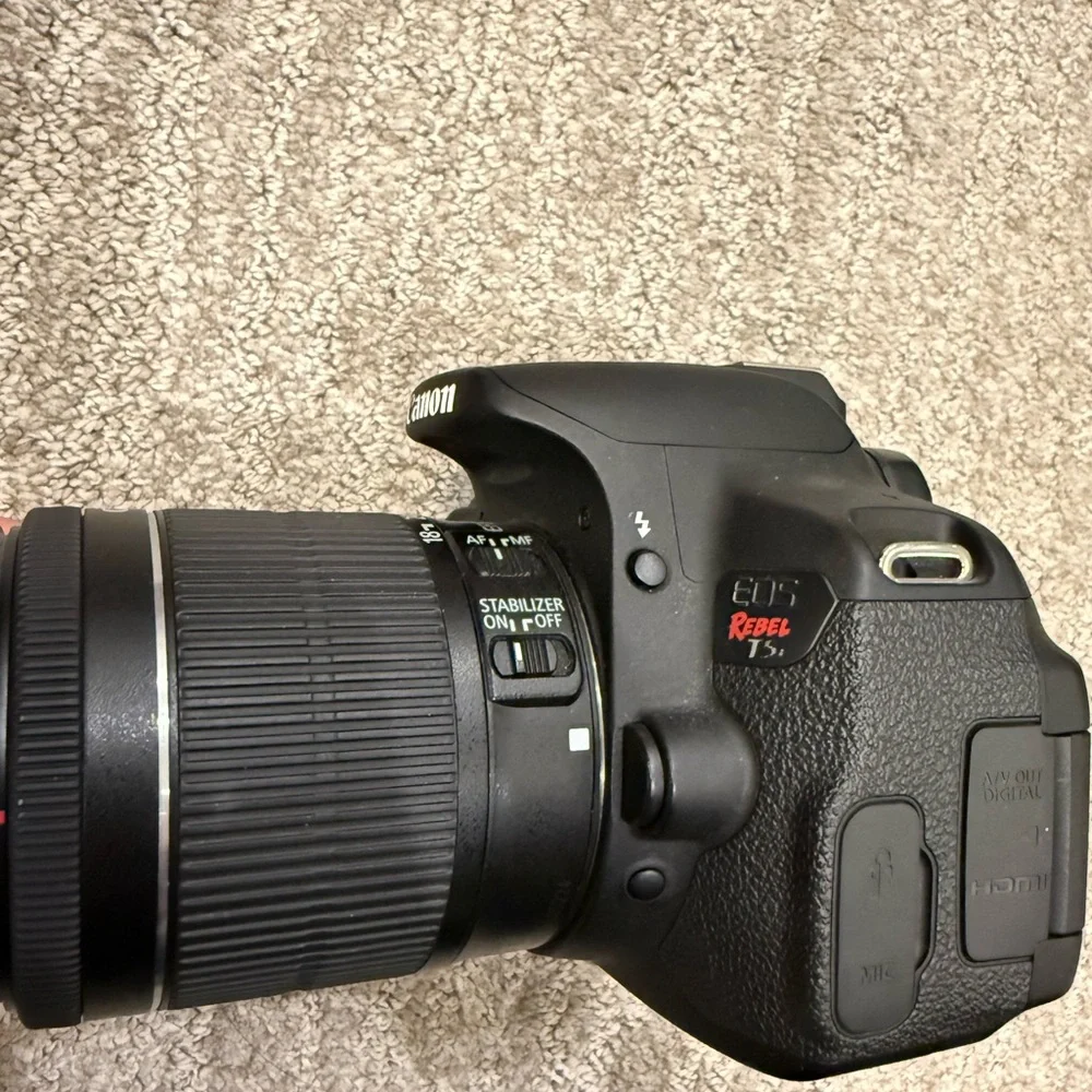 Canon EOS Rebel T5i Black DSLR Camera with Portable Battery Charging Box